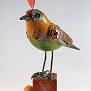 The Fat Finch Boutique for Bird Lovers | Bird with Locket on Bocce Ball Sculpture by Mullanium